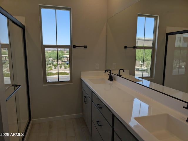 9408 E Sequence Ave, Mesa, AZ 85212 - bathroom with double vanity and baseboards
