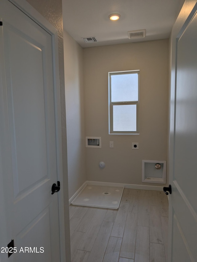 9408 E Sequence Ave, Mesa, AZ 85212 - washroom featuring electric dryer hookup, washer hookup, wood finished floors, heating unit, and hookup for a gas dryer