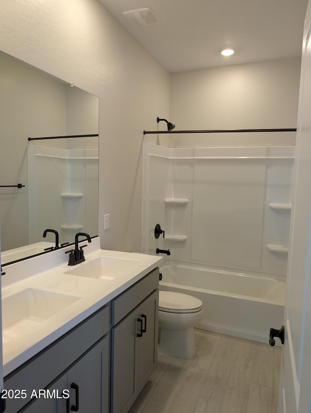 9408 E Sequence Ave, Mesa, AZ 85212 - bathroom with double vanity, washtub / shower combination, and recessed lighting