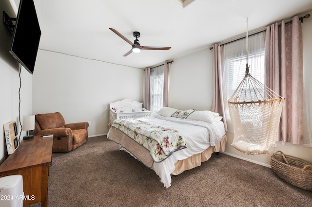 bedroom featuring ceiling fan and carpet flooring