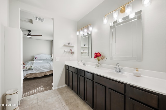 bathroom with tile patterned floors, ceiling fan, and vanity