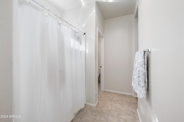 bathroom featuring tile patterned flooring