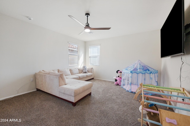 recreation room featuring ceiling fan and carpet flooring