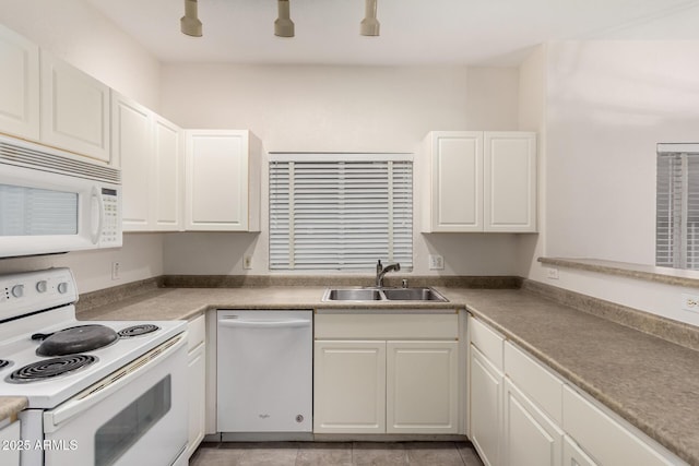7401 W Arrowhead Clubhouse Dr Unit 1006, Glendale, AZ 85308 - kitchen with a sink, white appliances, light tile patterned floors, and white cabinetry