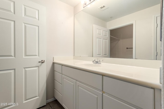 7401 W Arrowhead Clubhouse Dr Unit 1006, Glendale, AZ 85308 - bathroom with tile patterned floors, visible vents, and vanity