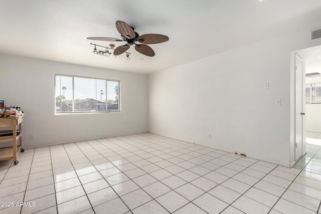 214 W June Cir, Mesa, AZ 85201 - spare room featuring a ceiling fan and light tile patterned flooring
