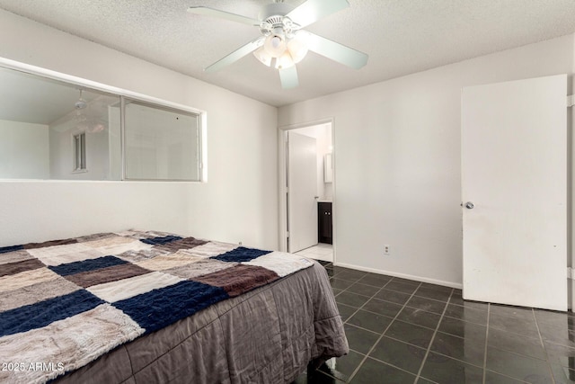 214 W June Cir, Mesa, AZ 85201 - bedroom featuring dark tile patterned floors, ceiling fan, and baseboards