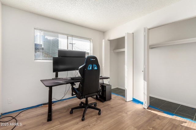 214 W June Cir, Mesa, AZ 85201 - office area featuring wood finished floors, a textured ceiling, and baseboards