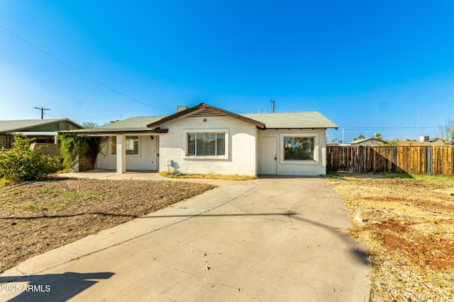 214 W June Cir, Mesa, AZ 85201 - view of front of property with stucco siding, roof with shingles, and driveway