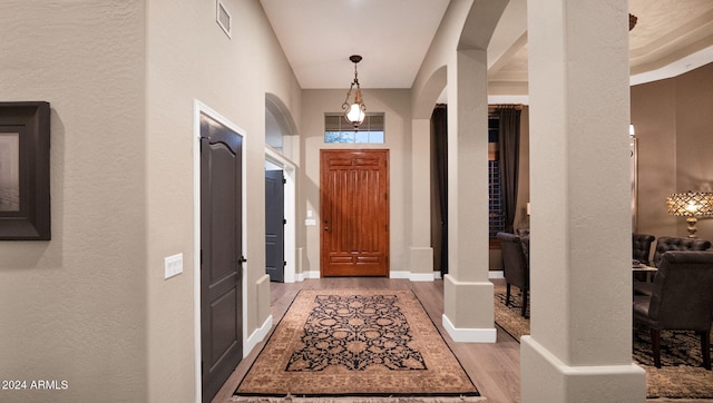 foyer entrance featuring hardwood / wood-style flooring