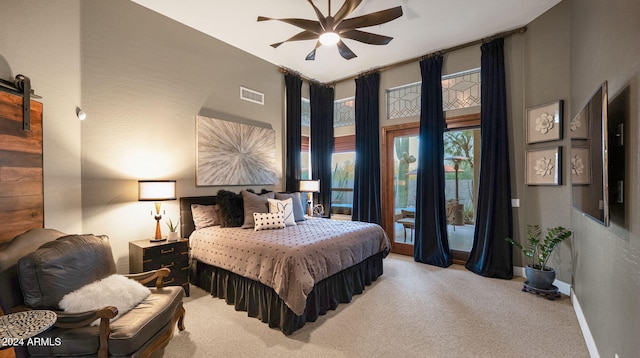 carpeted bedroom featuring ceiling fan and access to outside