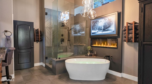 bathroom featuring separate shower and tub