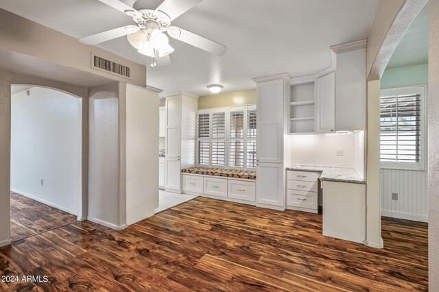 spare room with dark hardwood / wood-style floors