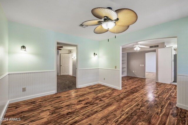 unfurnished room with light colored carpet and a textured ceiling