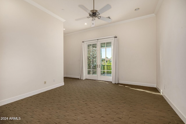 carpeted spare room featuring ceiling fan, crown molding, and french doors