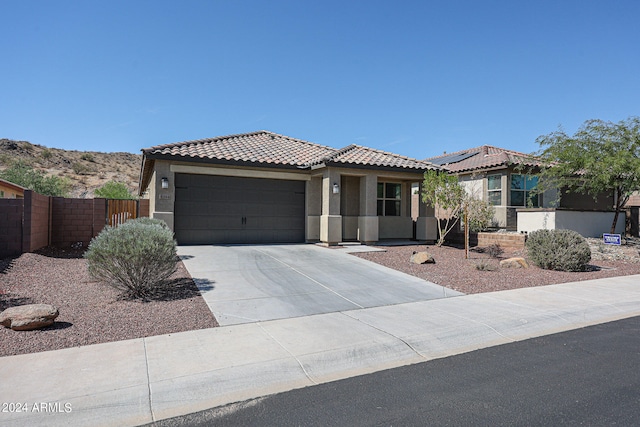 view of front of property featuring a garage