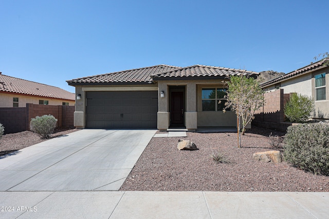 view of front of property featuring a garage