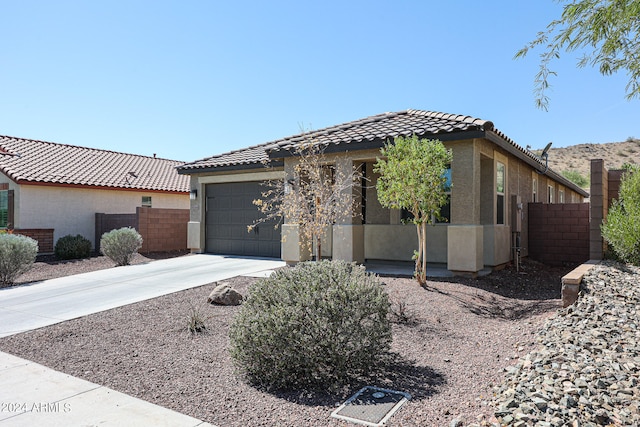 view of front of home featuring a garage