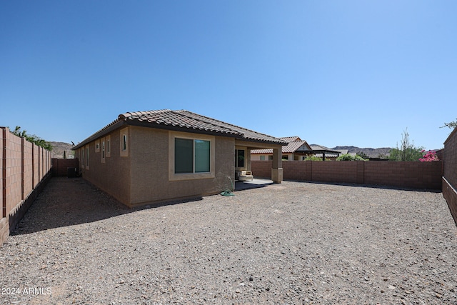 rear view of house with a patio area