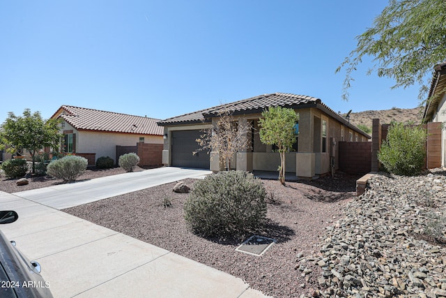 view of front of property with a garage