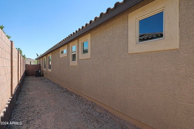 view of home's exterior featuring cooling unit