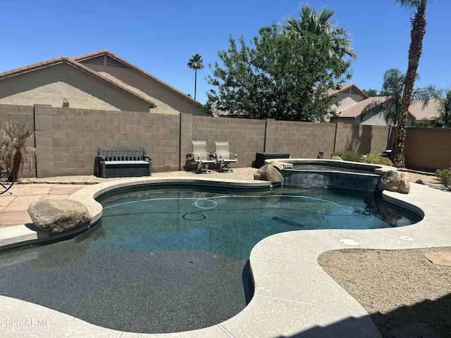 7326 W Dreyfus Dr, Peoria, AZ 85381 - view of swimming pool featuring fence, a pool with connected hot tub, and a patio area