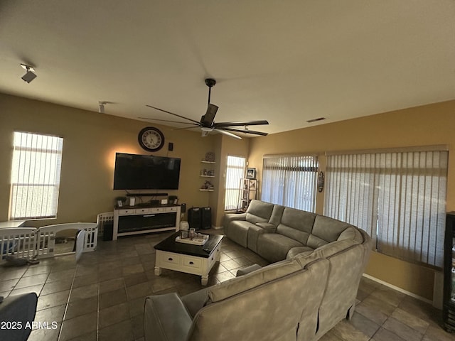 7326 W Dreyfus Dr, Peoria, AZ 85381 - tiled living room featuring a ceiling fan