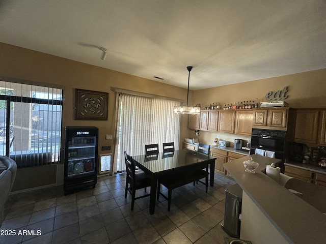 7326 W Dreyfus Dr, Peoria, AZ 85381 - dining room with a chandelier