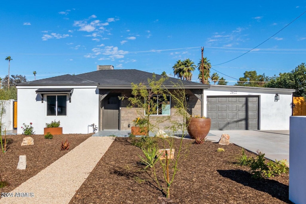 view of front of property featuring a garage