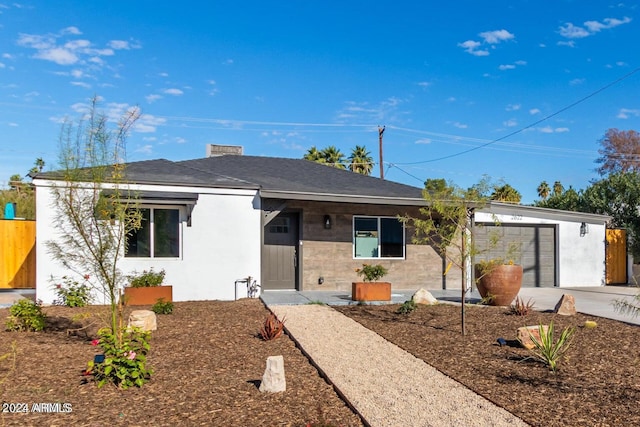 ranch-style home with a garage