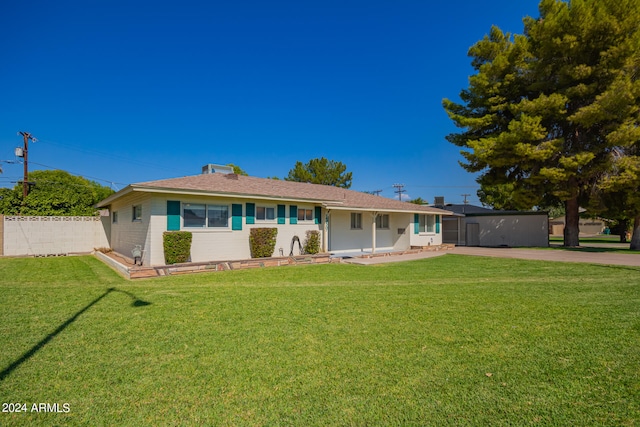 view of front of house with a front lawn