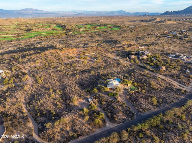 birds eye view of property featuring a mountain view