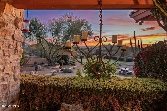 view of yard at dusk