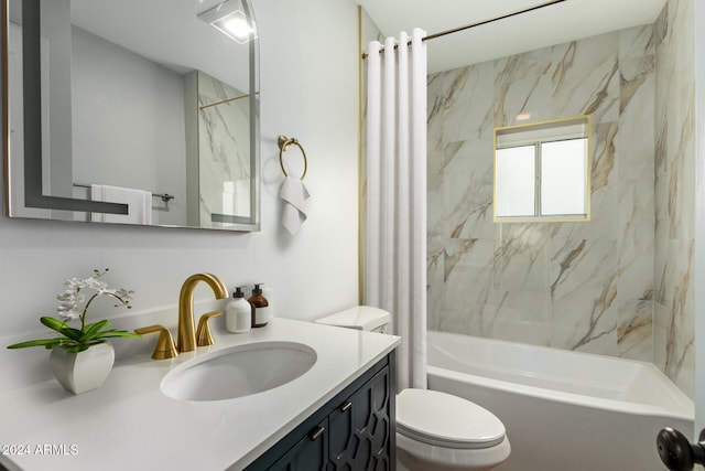 full bathroom featuring shower / bath combination with curtain, vanity, and toilet