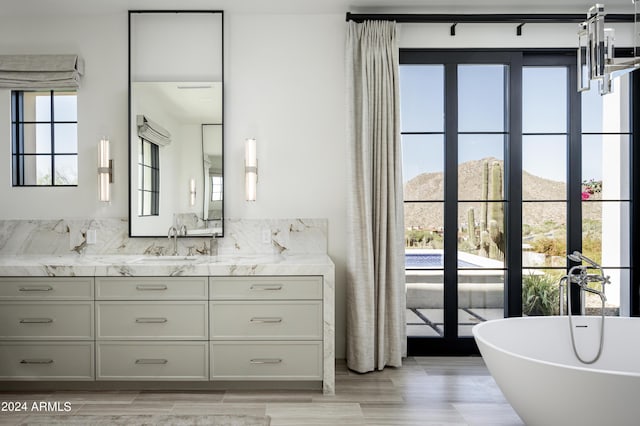 20958 N 112th St, Scottsdale, AZ 85255 - bathroom with vanity, a freestanding bath, and a mountain view