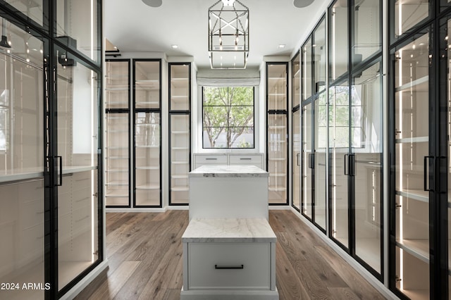 20958 N 112th St, Scottsdale, AZ 85255 - bathroom with wood finished floors and a chandelier