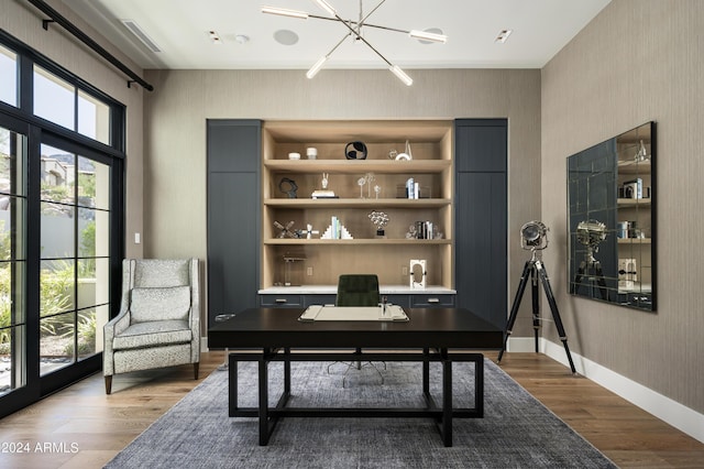 20958 N 112th St, Scottsdale, AZ 85255 - office space featuring dark wood-style floors, wallpapered walls, and a chandelier