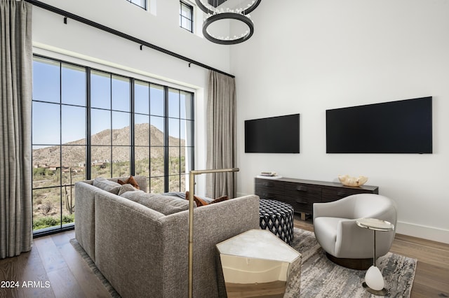 20958 N 112th St, Scottsdale, AZ 85255 - living room with wood finished floors and a towering ceiling