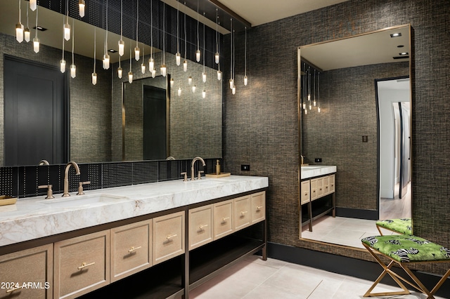 bathroom with tile patterned flooring and vanity