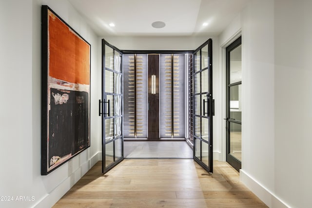 20958 N 112th St, Scottsdale, AZ 85255 - foyer entrance with french doors and wood finished floors