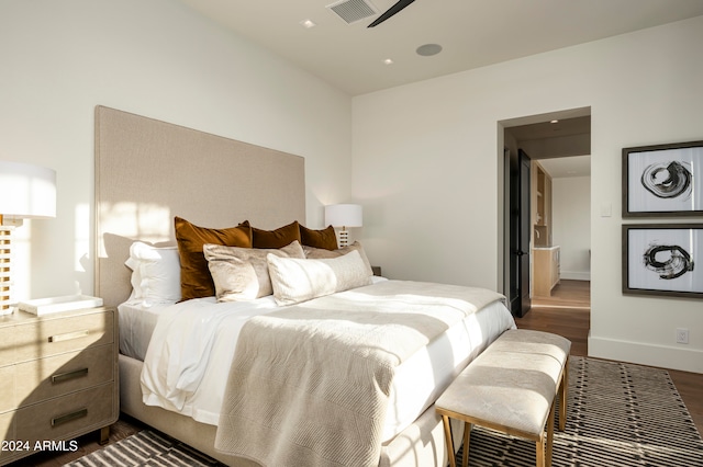 bedroom featuring dark hardwood / wood-style floors