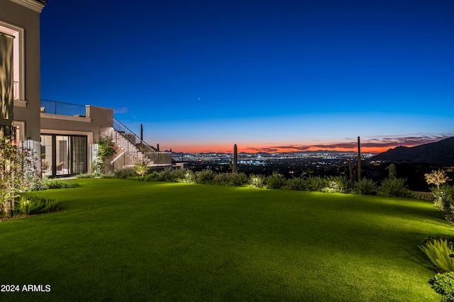 yard at dusk with a mountain view