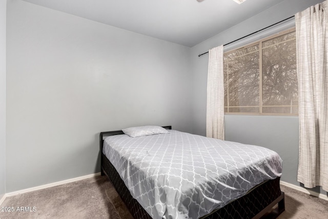 carpeted bedroom with baseboards