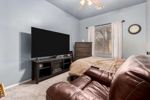 interior space with baseboards, visible vents, and a ceiling fan