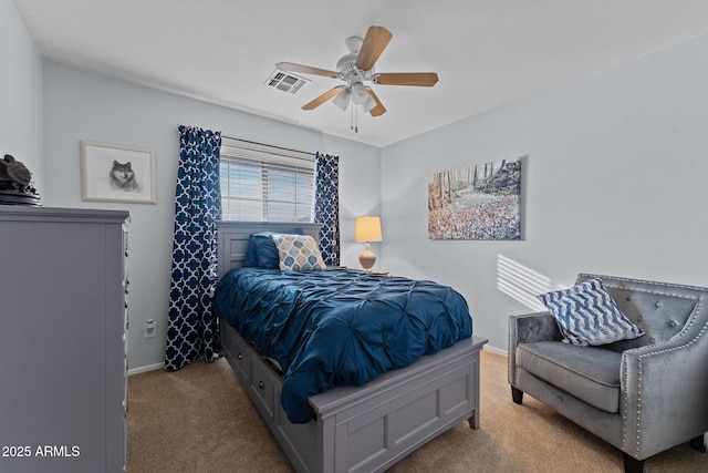 bedroom with light carpet and ceiling fan