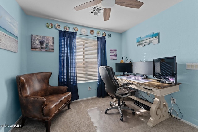 office area featuring ceiling fan, light colored carpet, and a healthy amount of sunlight