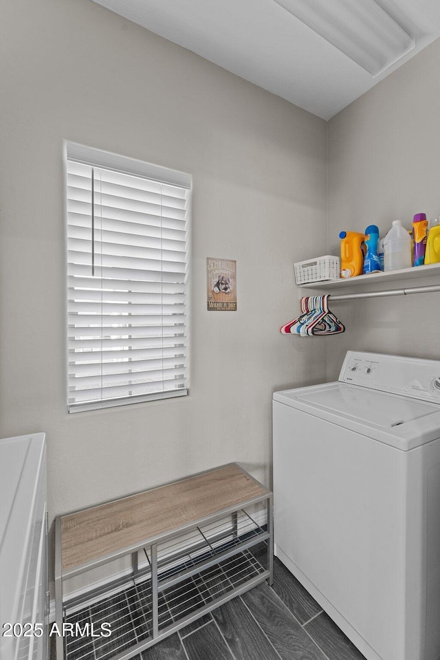 washroom with independent washer and dryer