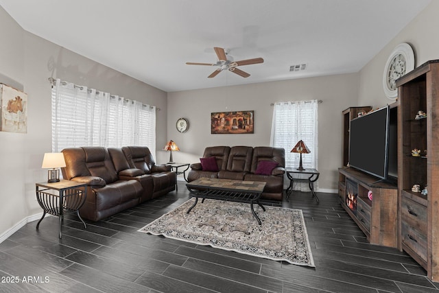 living room featuring ceiling fan