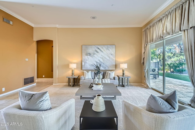 living room featuring crown molding