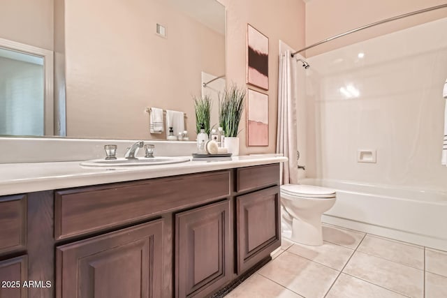 full bathroom with toilet, tile patterned floors, shower / washtub combination, and vanity